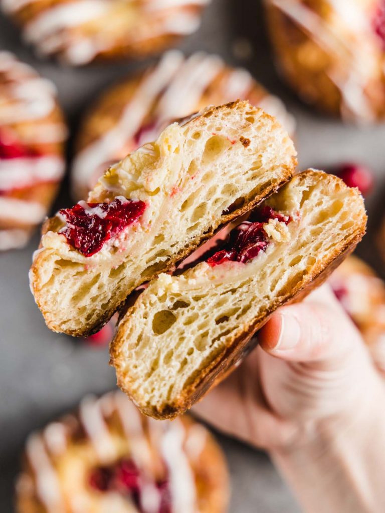 Danish cut in half to see layers being held up.