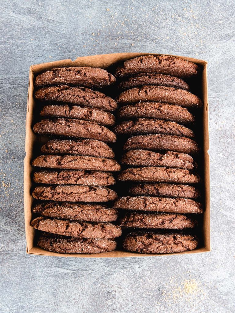 Cookies in open box from above.