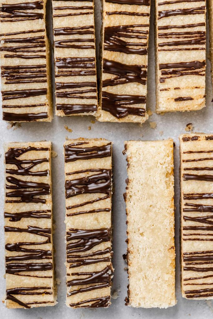 Sliced shortbread cookies close up on board.