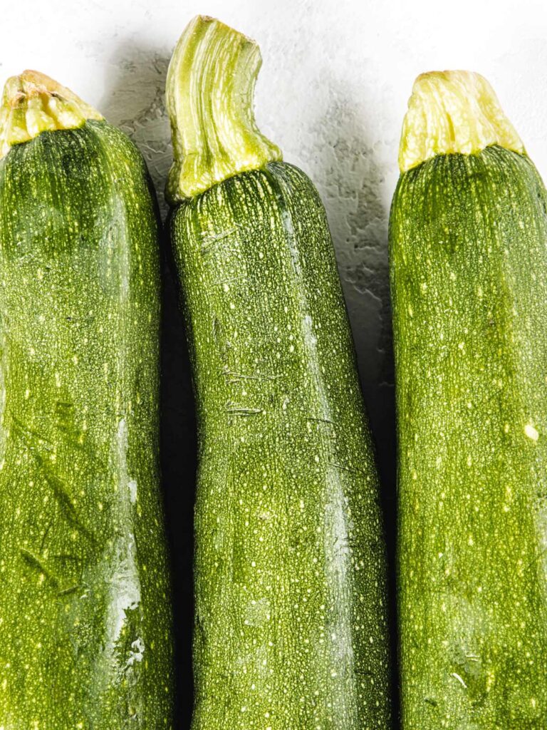 Close up of three zucchini.