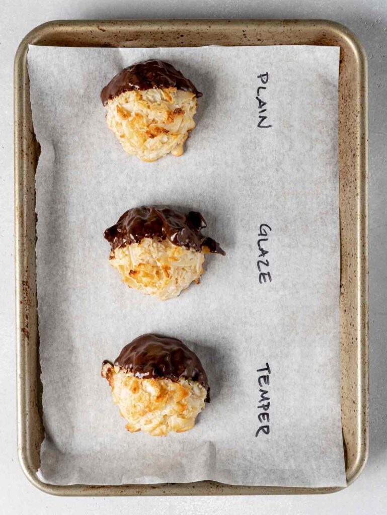 Chocolate dipped testing on macaroons.