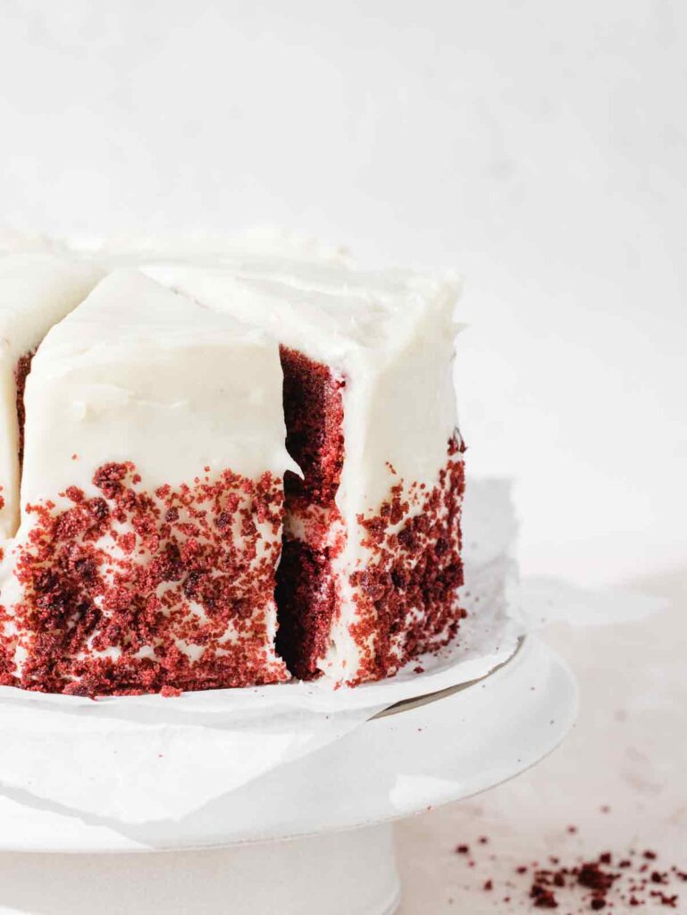 Layer cake with slices on stand.