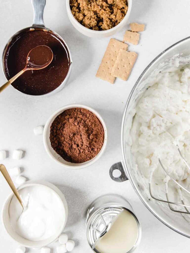 Mise en place of ice cream ingredients in small bowls.