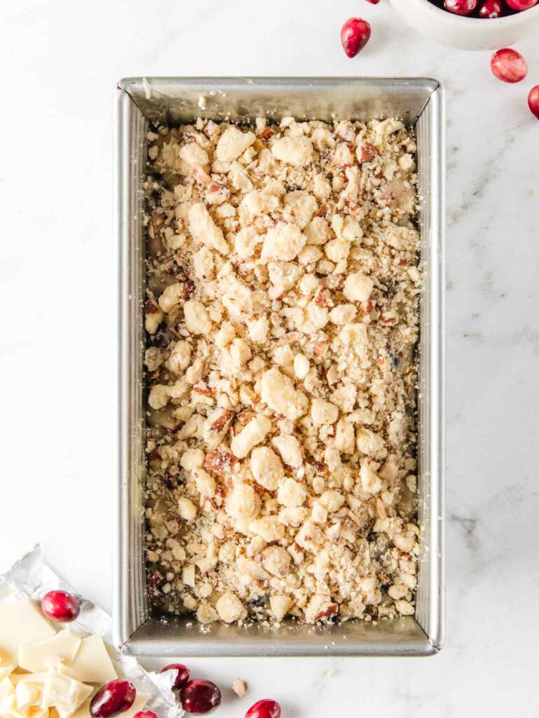 Unbaked loaf cake in tin.