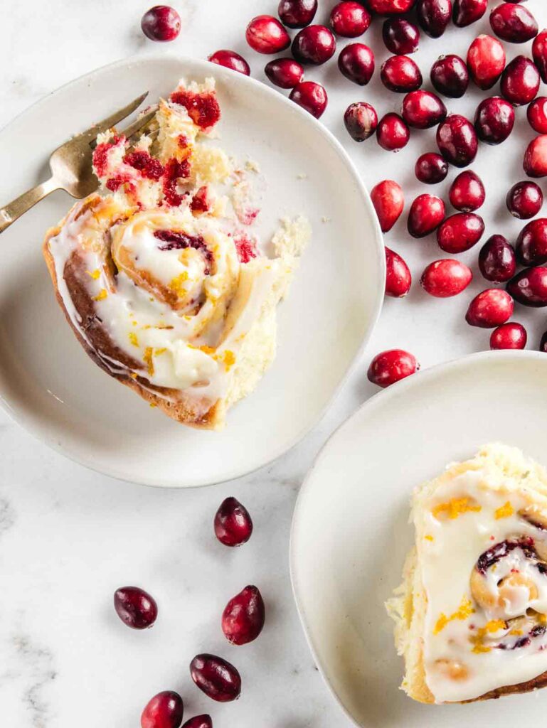 Cranberry rolls on plate with fork.