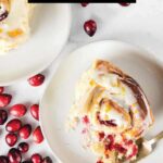 Cranberry rolls on plate with fork.