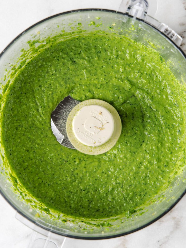 Food processor with pea pesto.