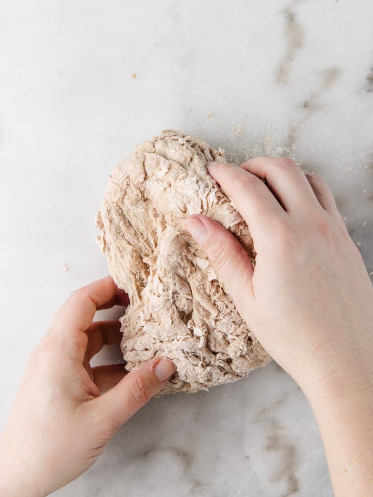 Kneading shaggy dough.