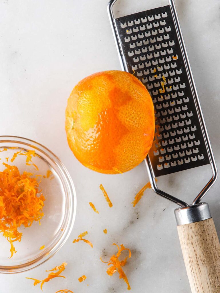 Zesting orange with microplane.