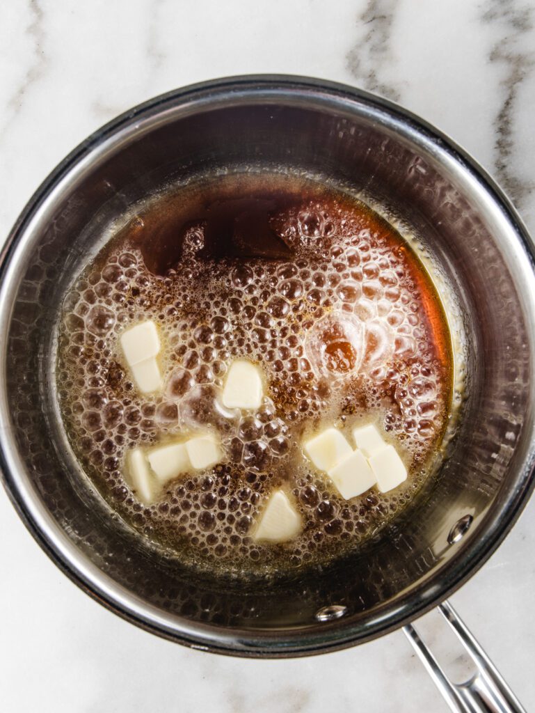 Butter in caramel pan.