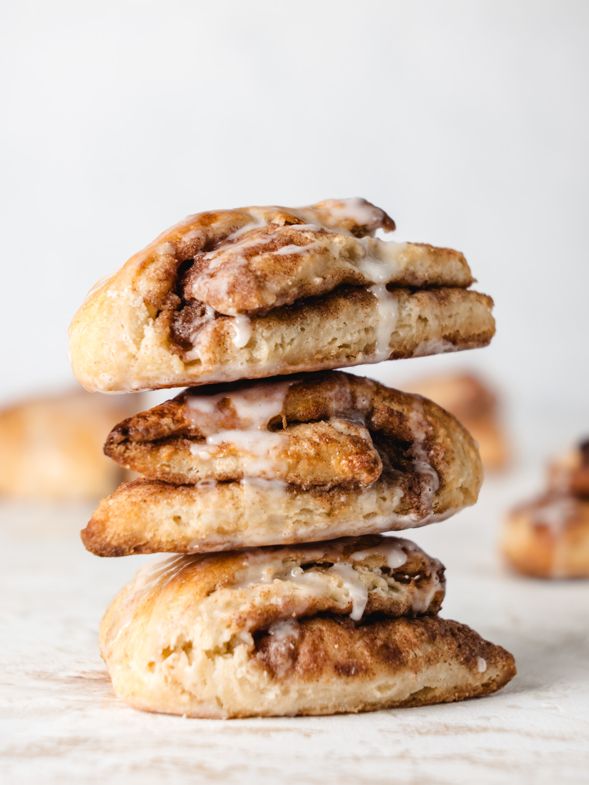 Stack of three scones with cinnamon swirls.